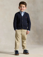 Boy modelling the Ralph Lauren bedford flex trousers.