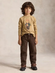 Boy modelling the Ralph Lauren long sleeve polo bear t-shirt.