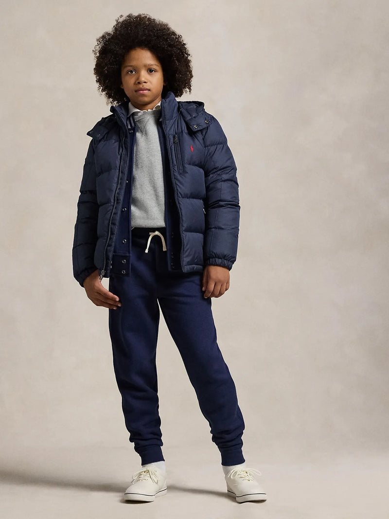 Boy modelling the Ralph Lauren padded jacket.