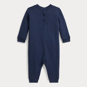 Rear view of the Ralph Lauren navy polo bear romper.