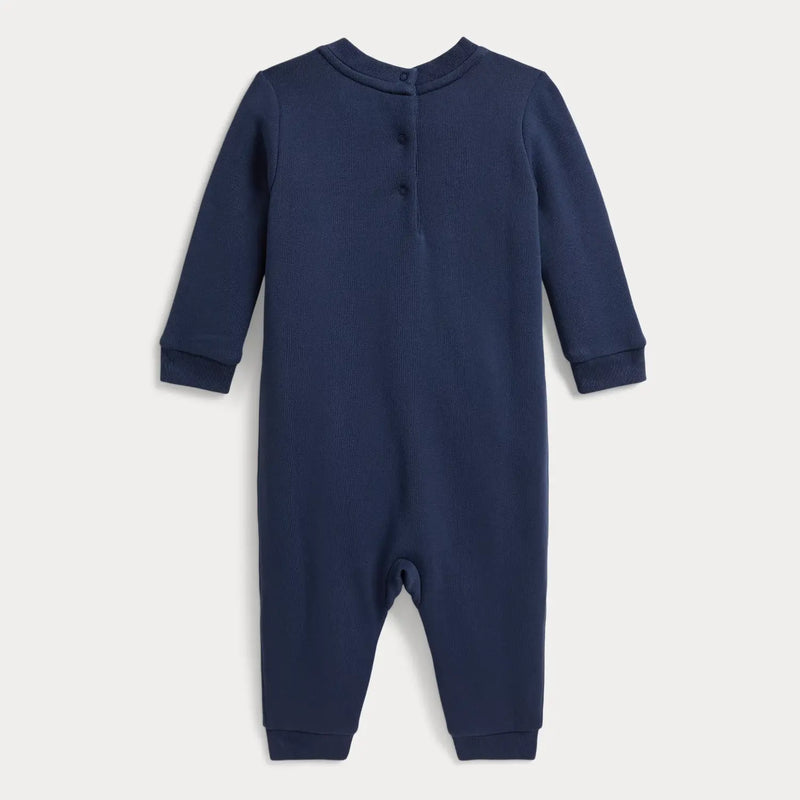 Rear view of the Ralph Lauren navy polo bear romper.