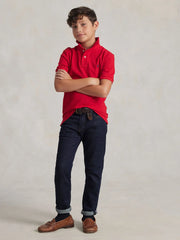 Boy modelling the Ralph Lauren iconic mesh polo shirt.