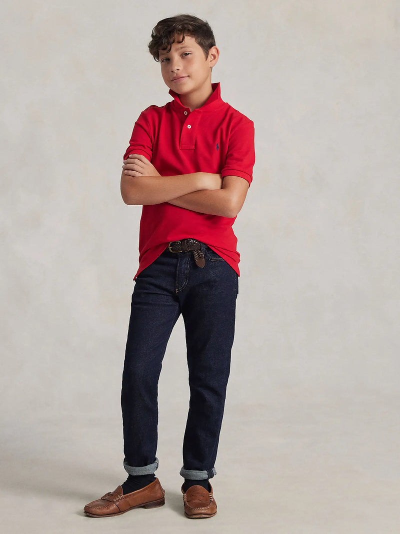 Boy modelling the Ralph Lauren iconic mesh polo shirt.