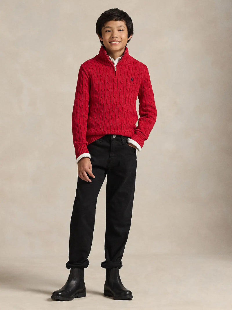 Boy wearing the Ralph Lauren quarter zip jumper.