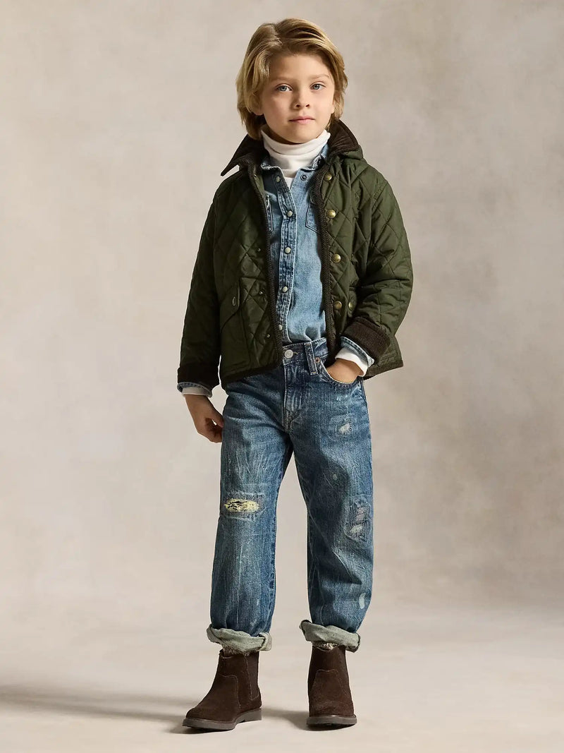 Boy modelling the Ralph Lauren quilted jacket.