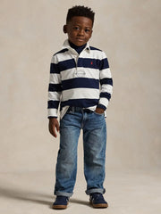 Boy modelling the Ralph Lauren rugby shirt.