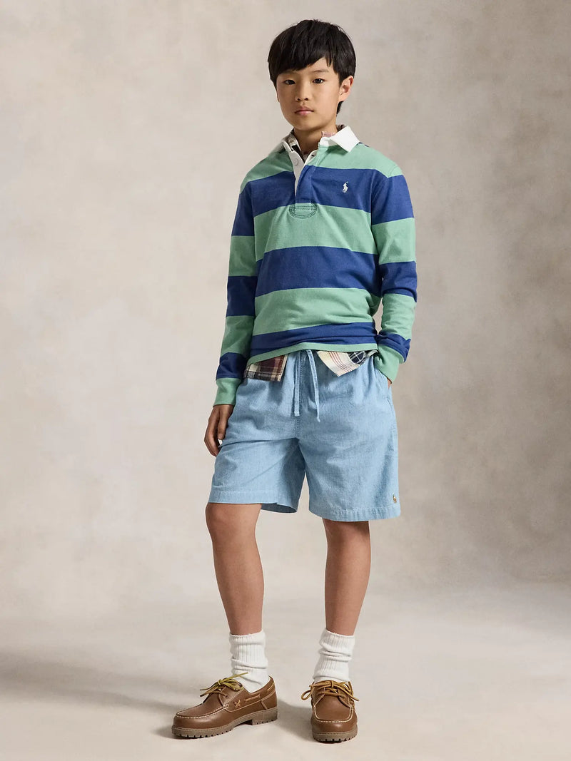 Boy wearing the Ralph Lauren rugby shirt.