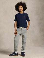 Boy modelling the Ralph Lauren t-shirt.