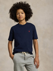 Boy wearing the Ralph Lauren t-shirt.