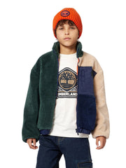Boy wearing the Timberland colourblock fleece.