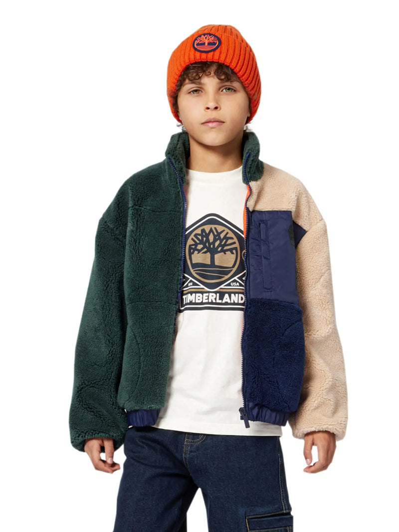 Boy wearing the Timberland colourblock fleece.