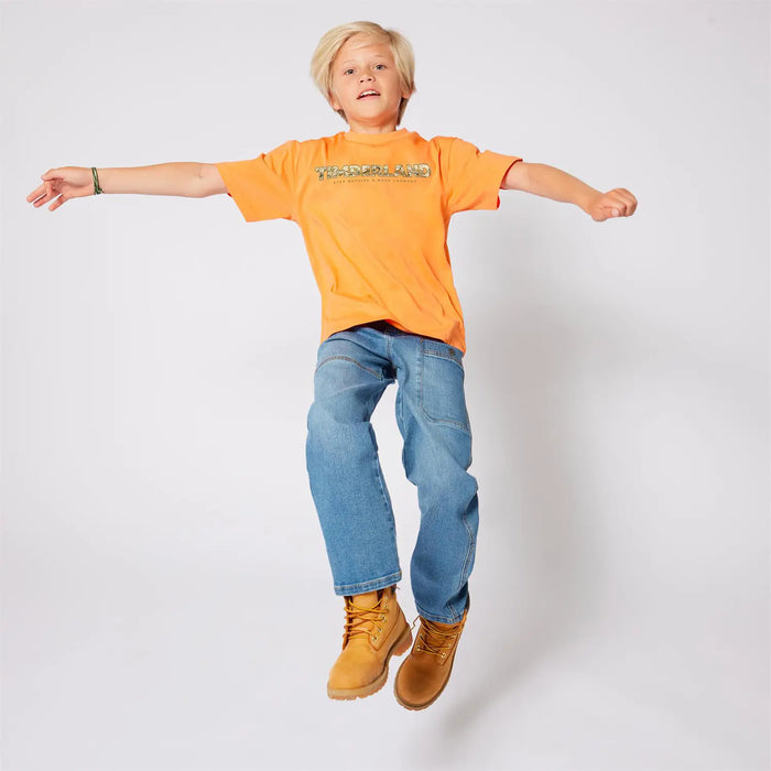 Boy wearing the Timberland logo t-shirt.