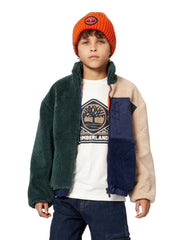 Boy wearing the Timberland logo t-shirt.