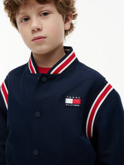 Tommy Hilfiger bomber jacket with flag logo patch on the chest.