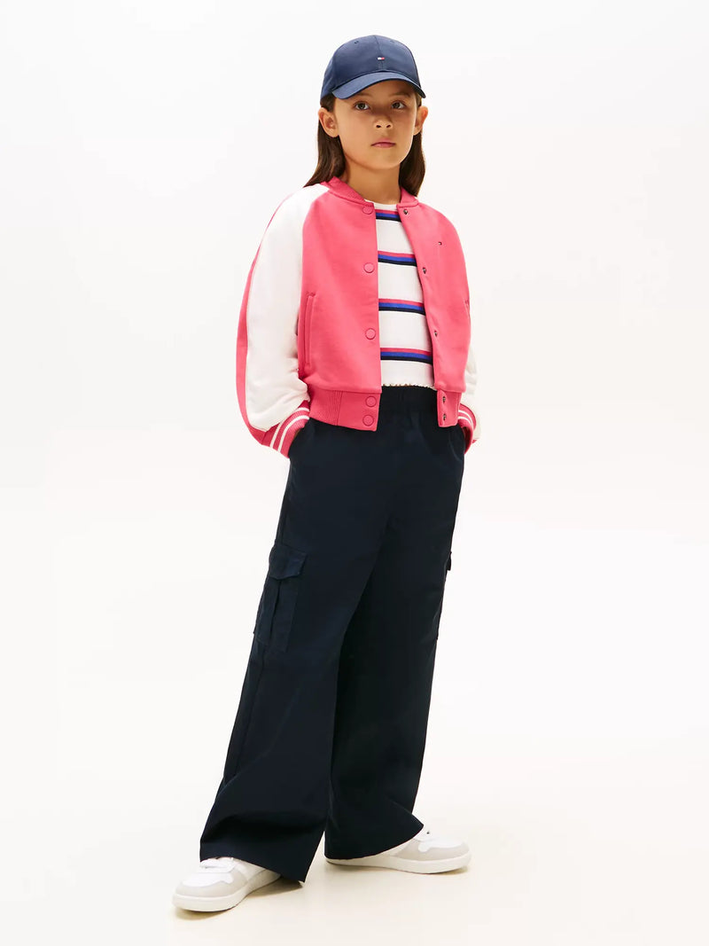 Girl modelling the Tommy Hilfiger bomber jacket.