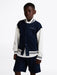 Boy modelling the Tommy Hilfiger bomber jacket.