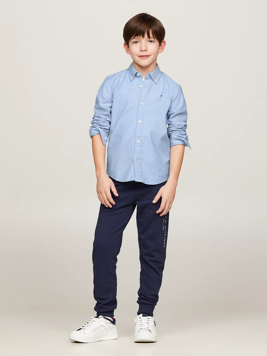 Boy modelling the Tommy Hilfiger Blue Oxford Shirt.