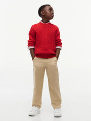 Tommy Hilfiger red cable knit sweater, modelled by boy.