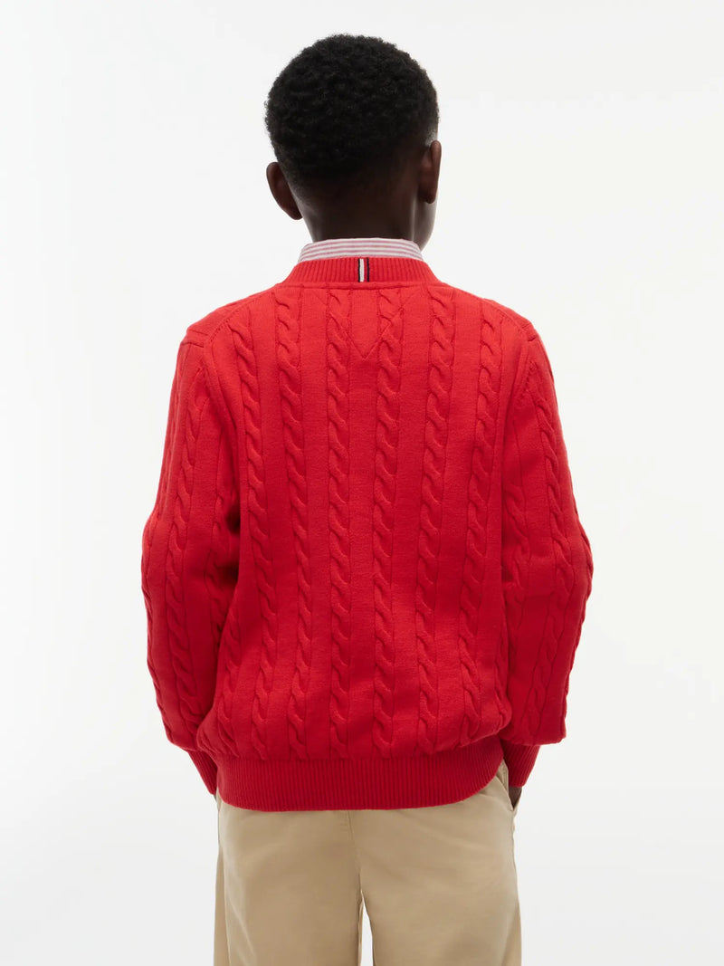 Rear view of the Tommy Hilfiger red cable knit sweater.
