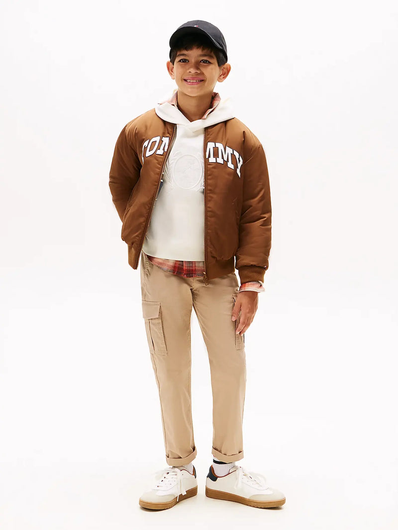 Boy modelling the Tommy Hilfiger cargo pants.