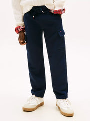 Tommy Hilfiger cargo track bottoms with flag branding on the side pocket.