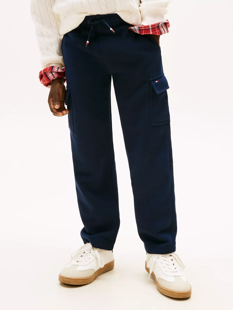 Tommy Hilfiger cargo track bottoms with flag branding on the side pocket.