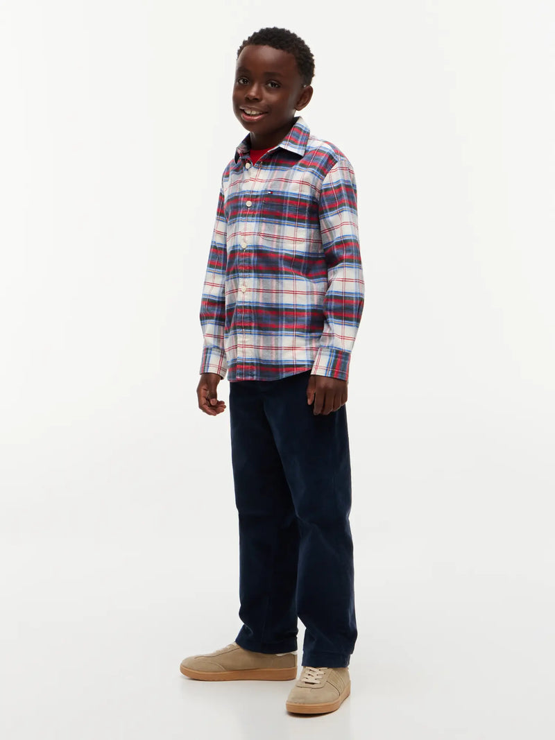 Boy wearing the Tommy Hilfiger check shirt.