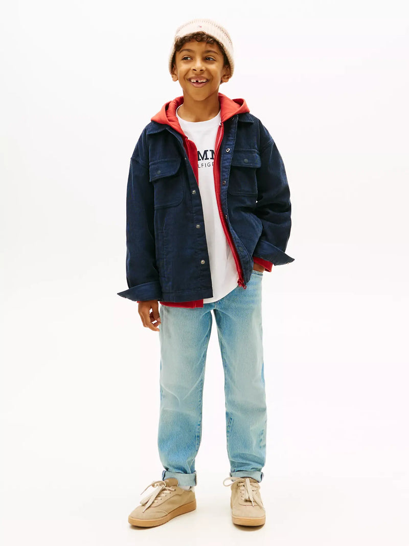 Boy wearing the Tommy Hilfiger corduroy shirt.