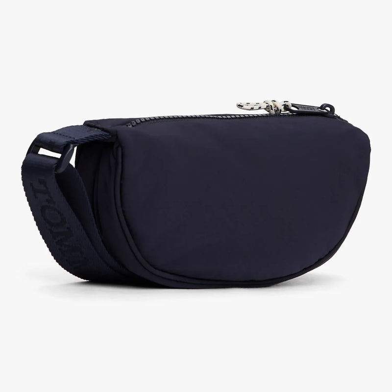 Back of the Tommy Hilfiger navy crossbody moon bag.