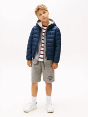 Boy wearing the Tommy Hilfiger down jacket.