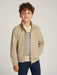 Boy modelling the Tommy Hilfiger essential jacket.