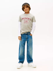 Boy modelling the Tommy Hilfiger faded logo t-shirt.