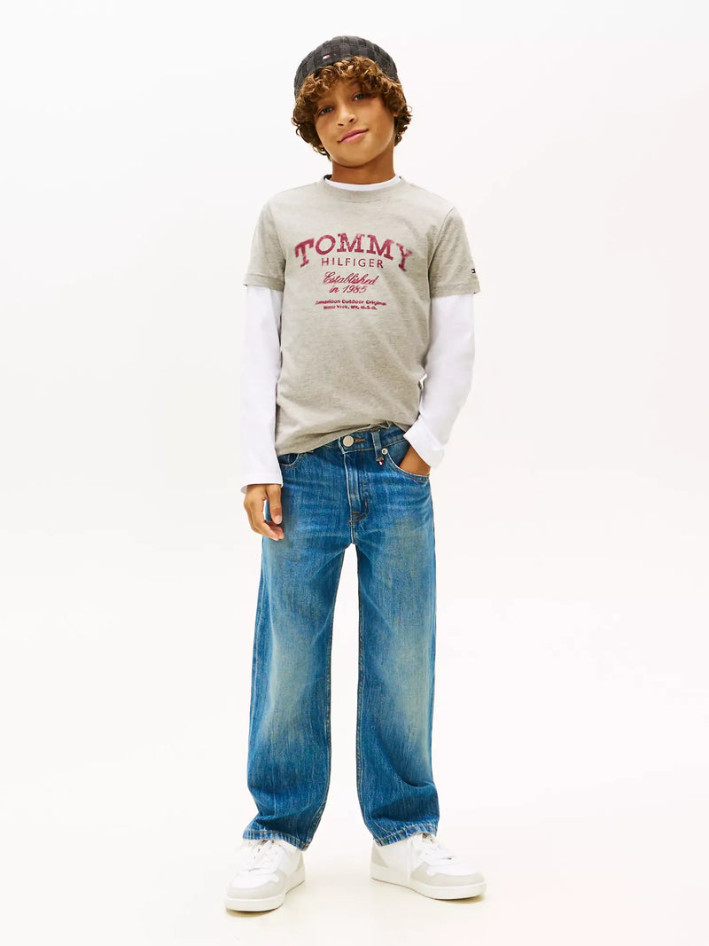 Boy modelling the Tommy Hilfiger faded logo t-shirt.