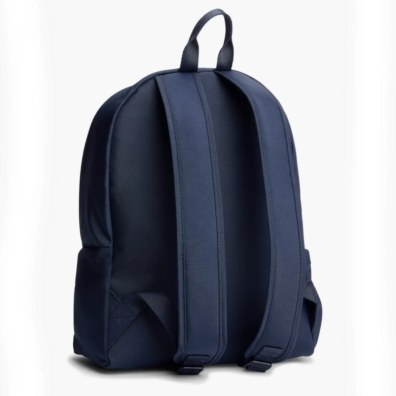 Back of the Tommy Hilfiger navy flag backpack.