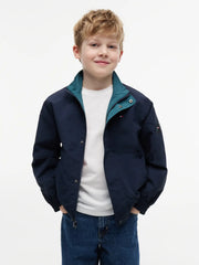 Navy side of the Tommy Hilfiger reversible jacket. 