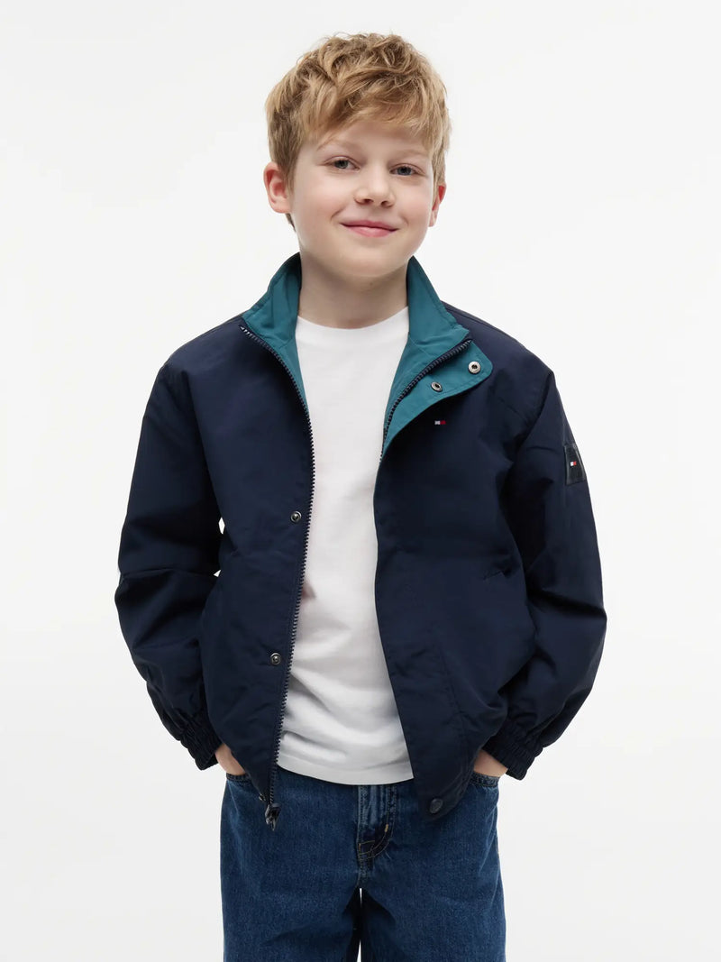 Navy side of the Tommy Hilfiger reversible jacket. 