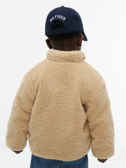 Back of the Tommy Hilfiger tan fleece jacket.