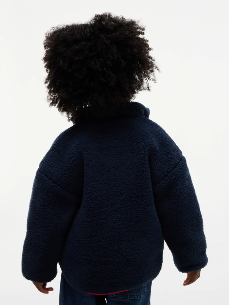 Back of the Tommy Hilfiger navy fleece jacket.