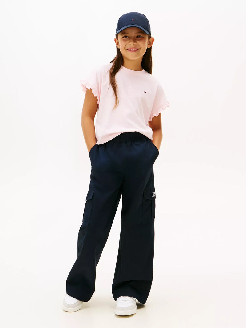 Girl modelling the Tommy Hilfiger frilled sleeve t-shirt.