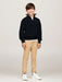 Boy wearing the Tommy Hilfiger half zip sweater.