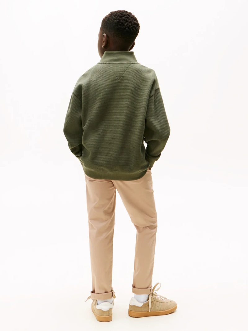 Rear view of the Tommy Hilfiger green half zip sweatshirt.