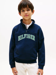 Tommy Hilfiger half zip sweatshirt with embroidered varsity logo.