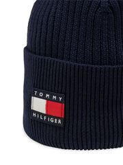 Closer look at the Tommy Hilfiger heritage beanie showing detail of the flag logo patch.