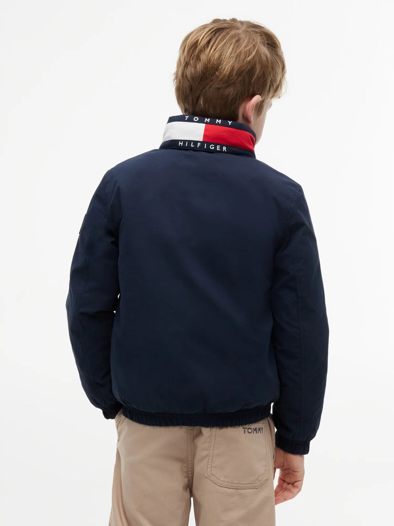 Rear view of the Tommy Hilfiger navy heritage essential jacket.