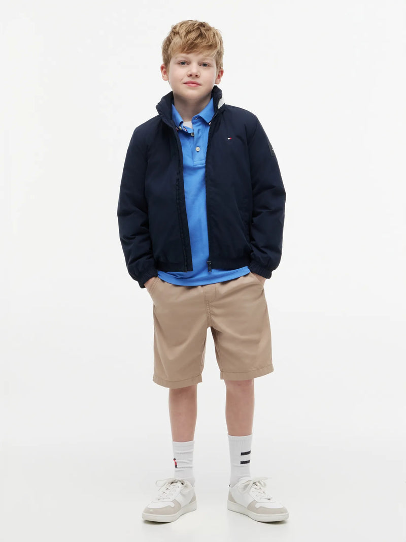 Boy wearing the Tommy Hilfiger heritage essential jacket.