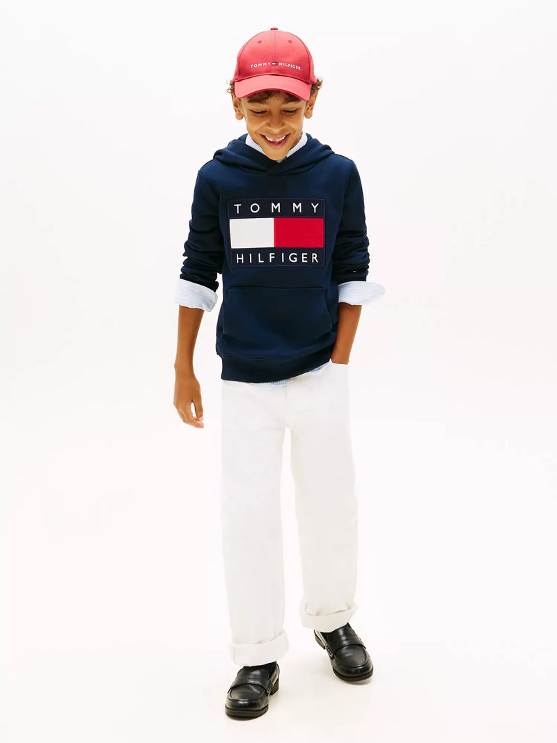 Boy wearing the Tommy Hilfiger heritage flag hoodie.