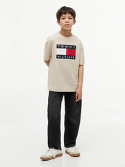 Boy wearing the Tommy Hilfiger heritage flag t-shirt.