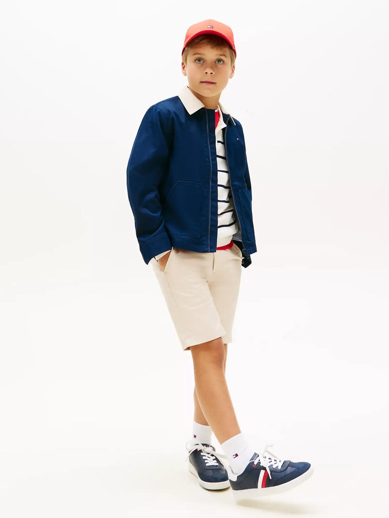 Boy wearing the Tommy Hilfiger contrast collar jacket.