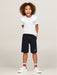 Boy modelling the Tommy Hilfiger logo t-shirt.