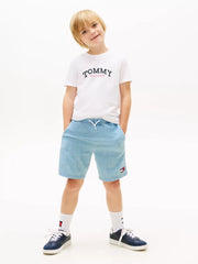 Boy modelling the Tommy Hilfiger monogram logo t-shirt.